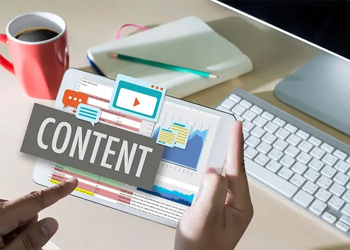 A person holding a tablet displaying analytics and graphics, overlaid with the word "CONTENT" and digital icons.