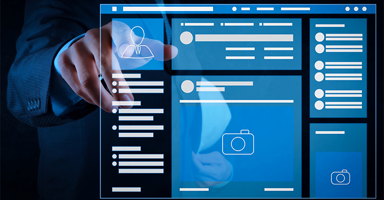 Person using a transparent touchscreen showing a futuristic social media dashboard with profiles, posts, and image placeholders.