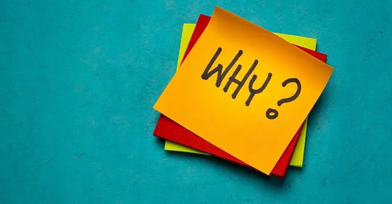 A stack of colorful sticky notes sits on a textured teal surface, with the top orange note displaying the handwritten word “WHY?” in bold black letters. The image evokes curiosity, reflection, or questioning of purpose or decisions.