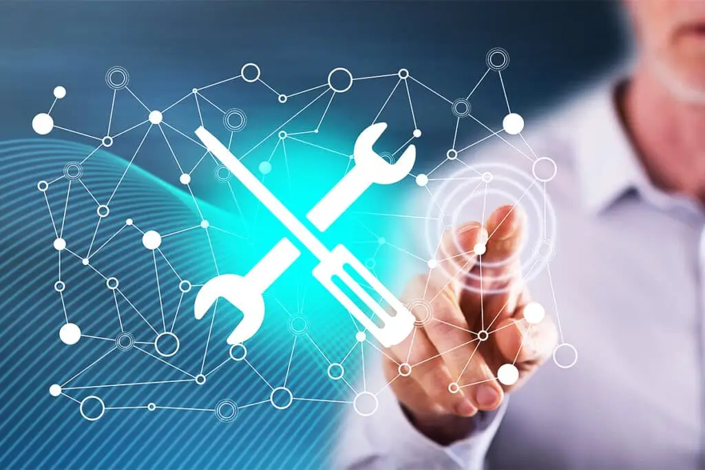 Digital Footprint Audit concept image showing a person touching a glowing interface with a large wrench and screwdriver icon over a connected network pattern. The visual suggests adjusting settings and fixing issues across online profiles and accounts.