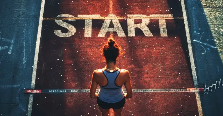 A runner stands behind a starting line on a red track beneath the large word “START”. The scene represents taking the first focused step to optimize your social media strategy.